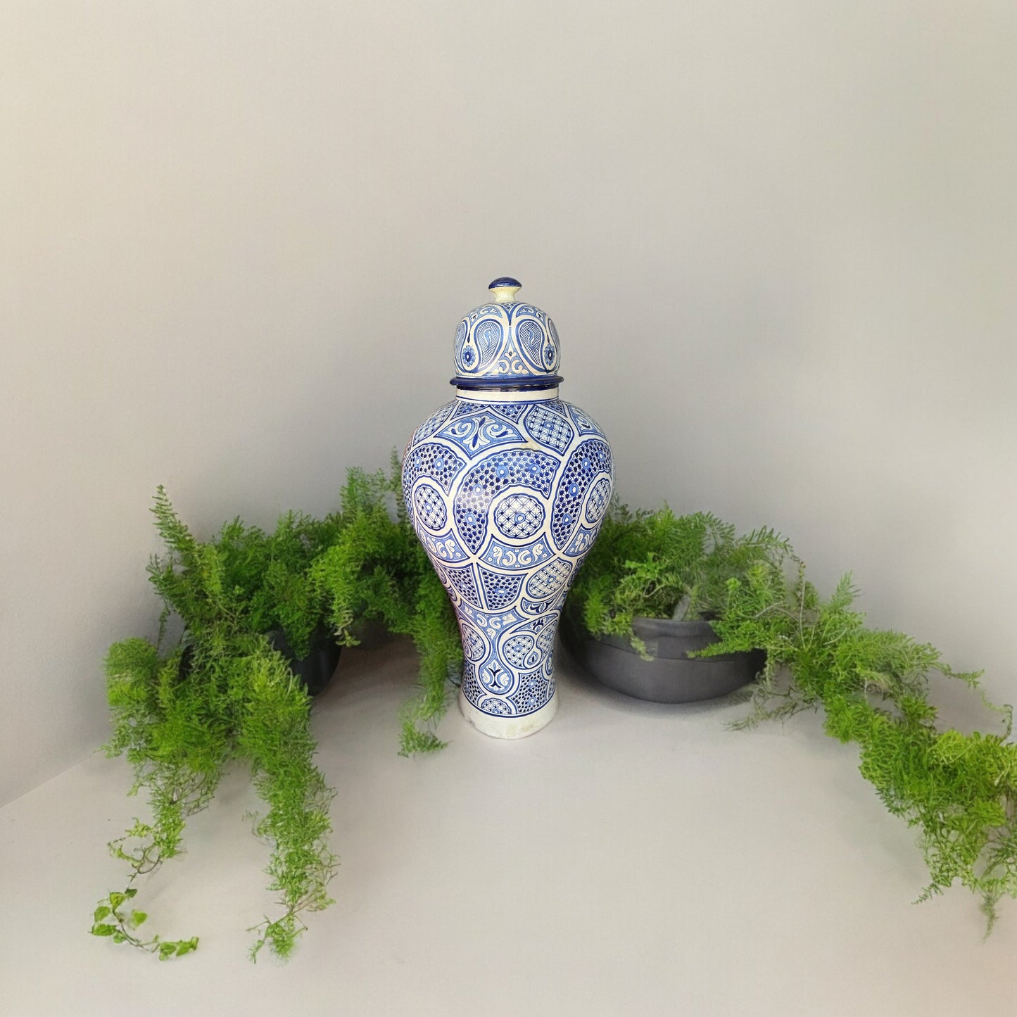 Blue antique Fez pottery by Justmorocco, featuring intricate patterns and a traditional Moroccan design.