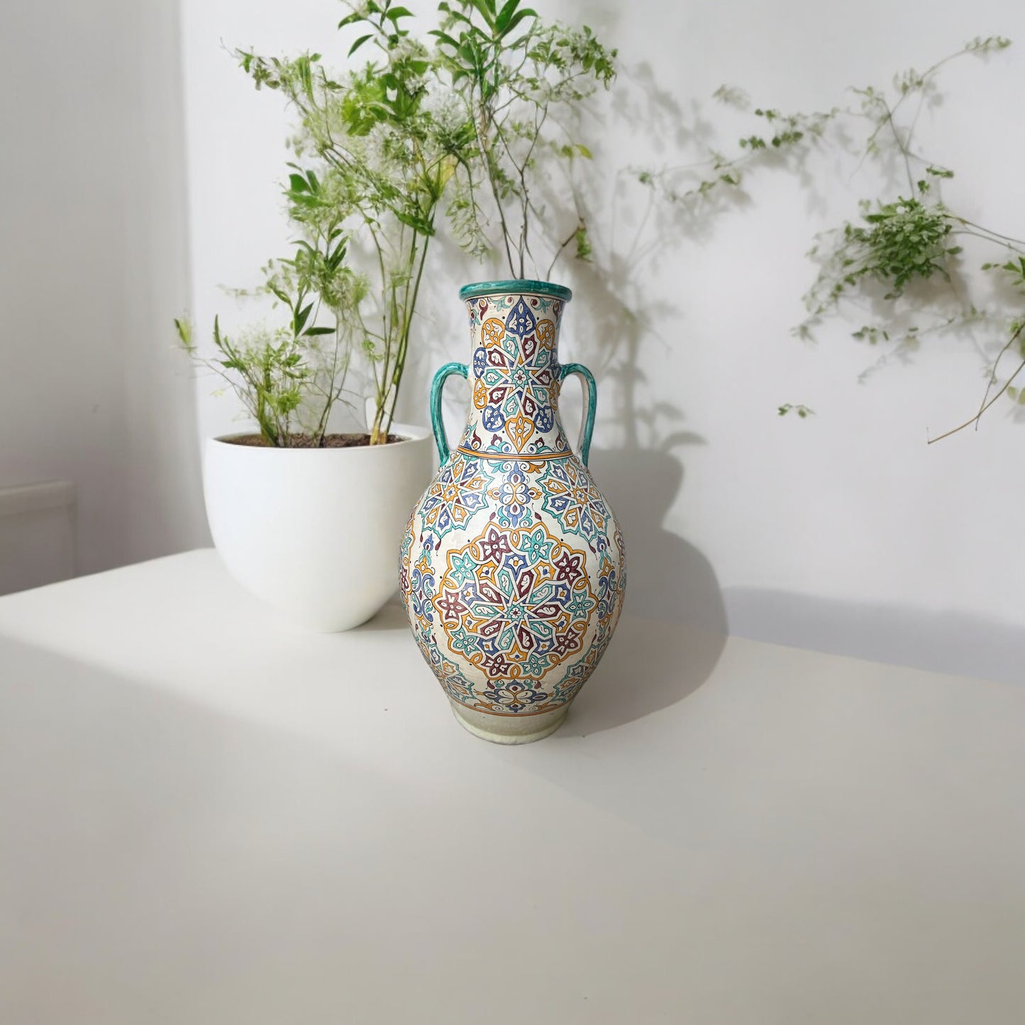 Justmorocco Fez pottery vase with intricate geometric patterns and earthy tones, showcasing traditional Moroccan craftsmanship.