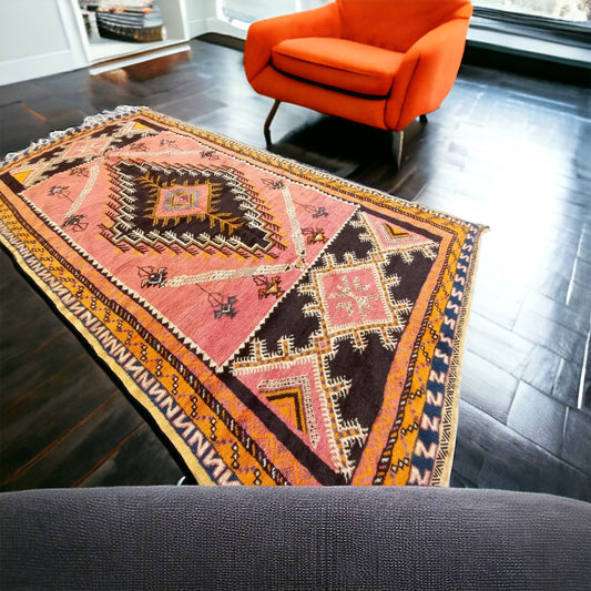 Vintage Taznakht area rug by Justmorocco with intricate geometric patterns in warm earthy tones, measuring 113 by 57 inches.