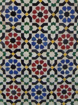 Moroccan Dareh Deluxe tile by Justmorocco featuring intricate geometric patterns in vibrant colors.