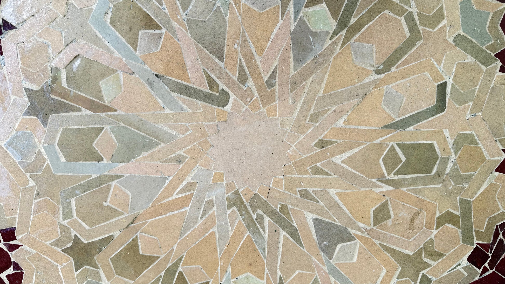 Moroccan Santa Barbara Tile by Justmorocco featuring intricate blue and white geometric patterns on ceramic surface.