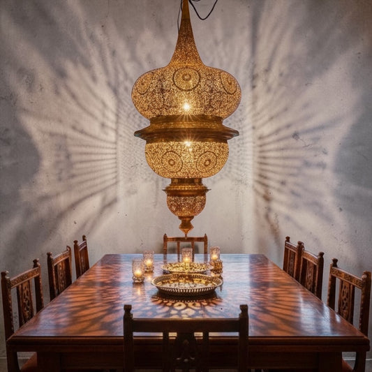 Large Moroccan brass chandelier by Justmorocco, ornate Moroccan lantern with intricate design and hanging chains for elegant lighting.