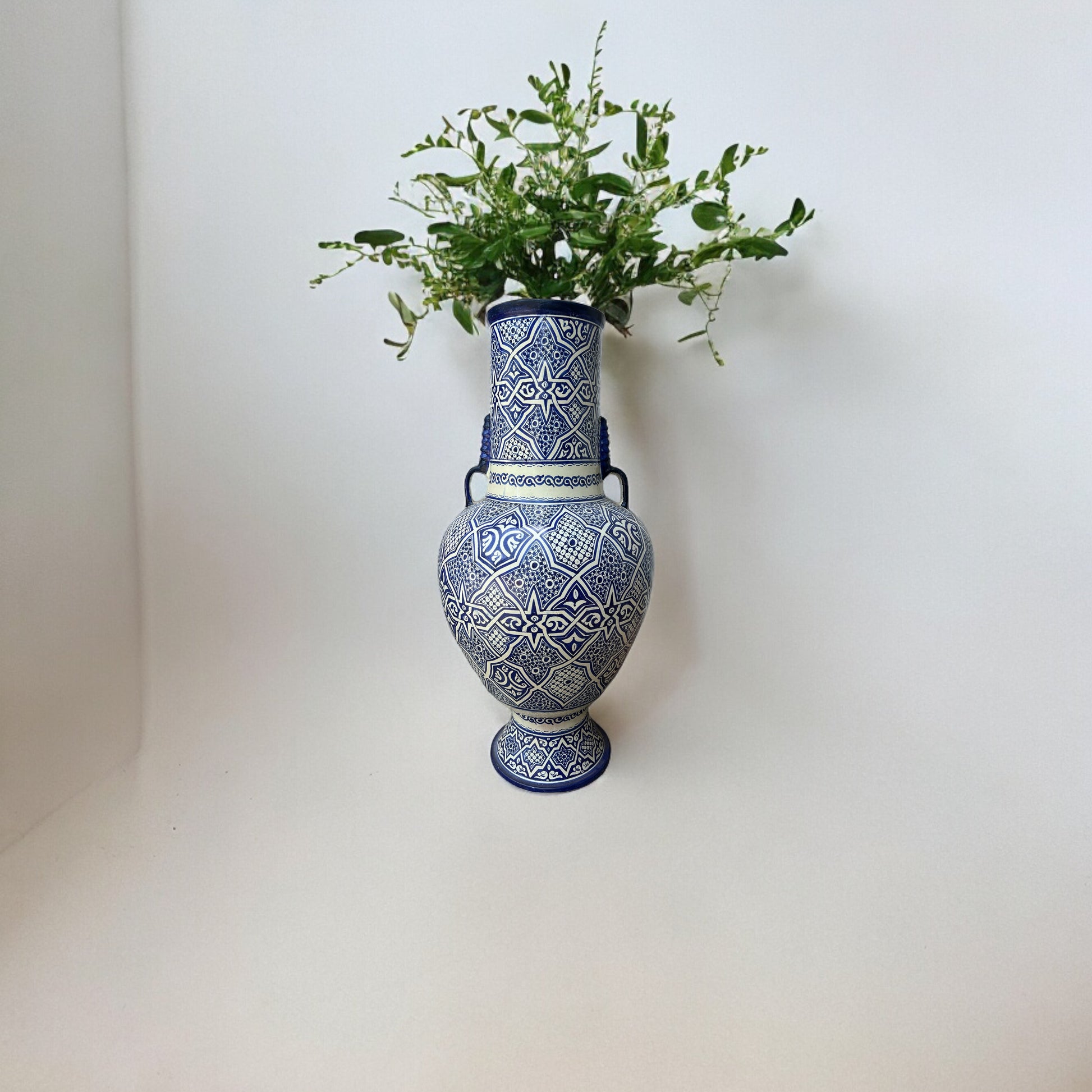 Old Fez antique pottery urn with intricate patterns, crafted by Justmorocco, showcasing traditional Moroccan ceramic art.