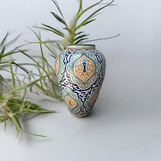 Large antique Fez urn by Justmorocco, showcasing traditional Moroccan pottery with intricate patterns and a rounded shape.