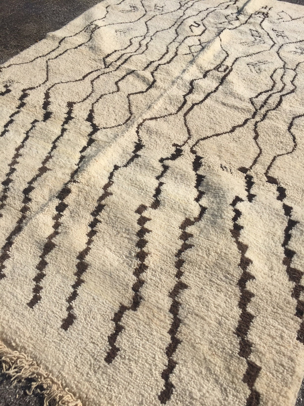 9ft 9in by 6ft 6in vintage Beni Ourain Moroccan rug with abstract handwoven design from Justmorocco.