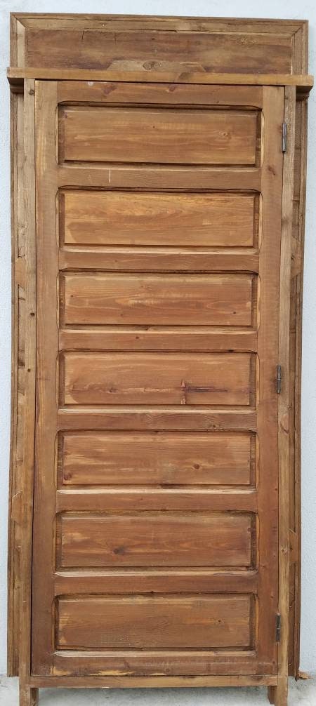 Vintage moroccan door handmade with metal knocker and umberella nail heads