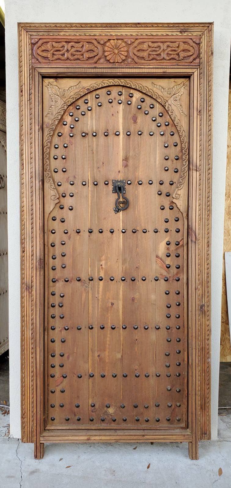 Vintage moroccan door handmade with metal knocker and umberella nail heads