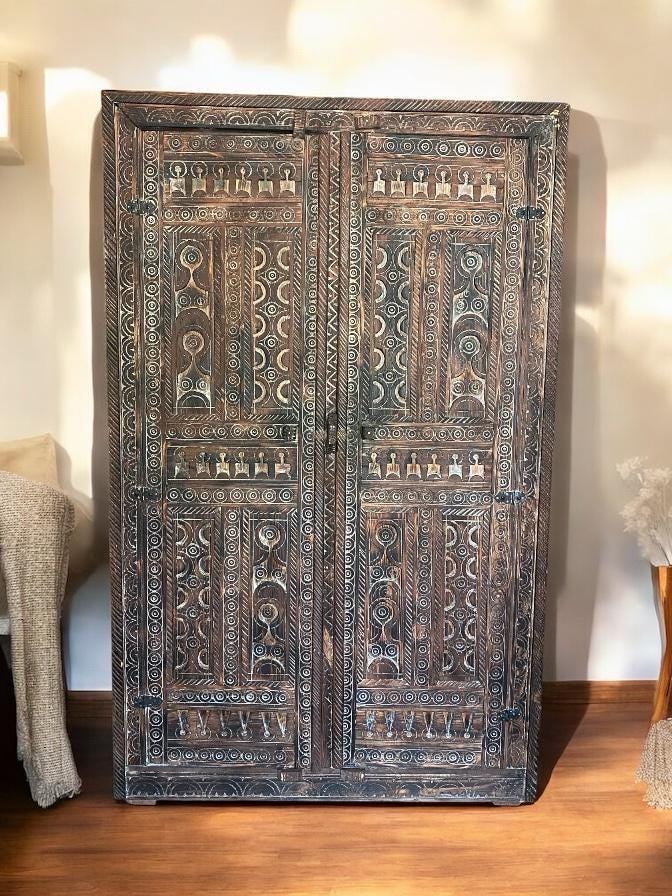 Handmade Moroccan Touareg African wooden armoire with tribal patterns, ideal for bedroom storage and ethnic-inspired decor.