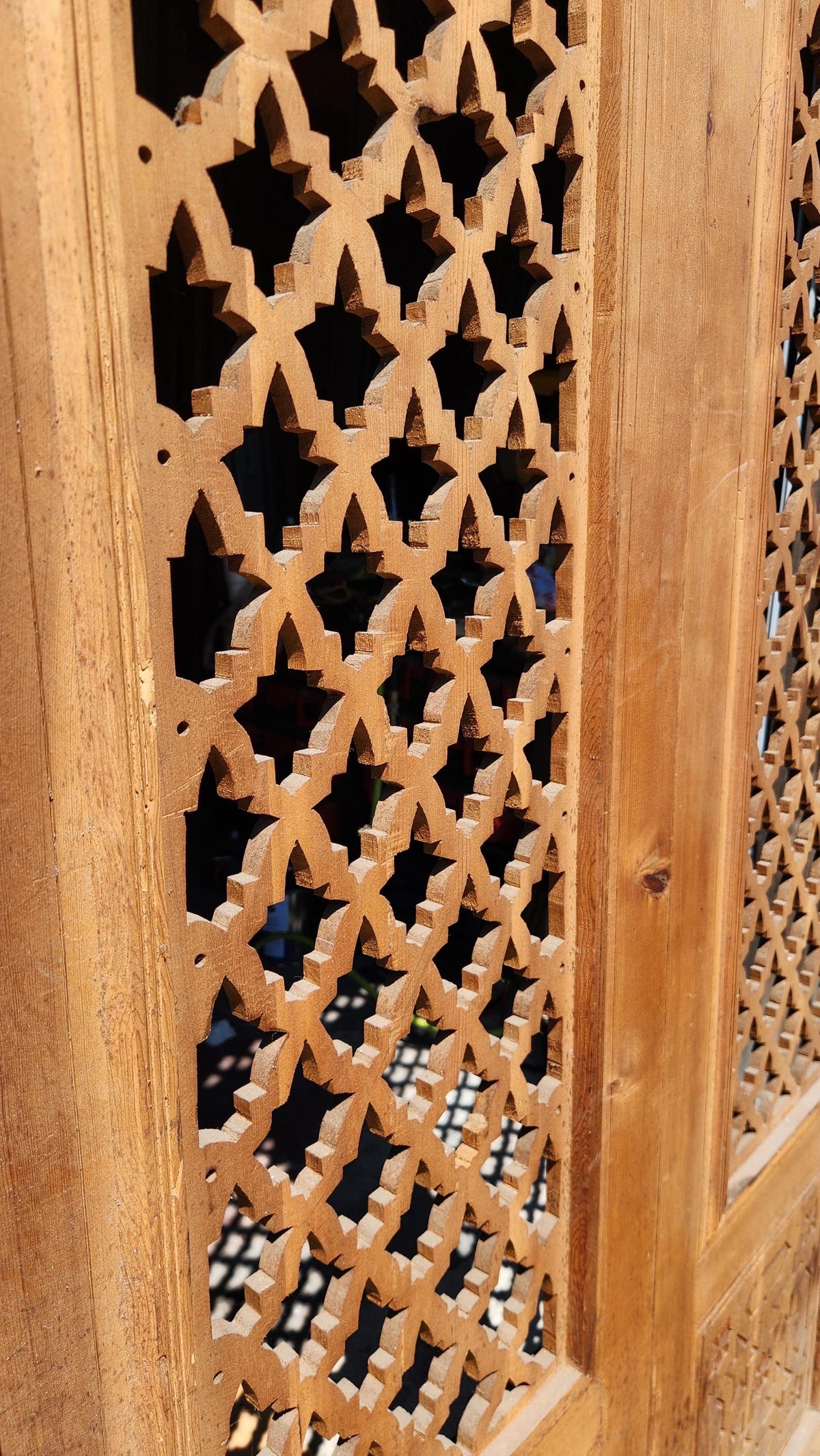 Old Moorish cedar wood door with 88-inch height, featuring Fleur de Lys panel carving by Justmorocco.
