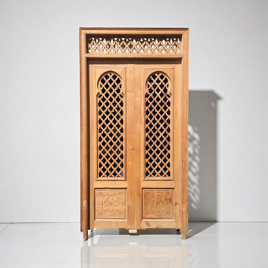 Old Moorish cedar wood door with fleur de lys panel carving, measuring 88x47 inches, by Justmorocco.