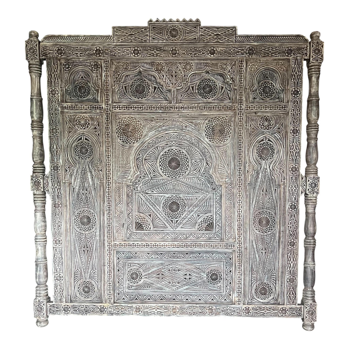 Moroccan carved headboard with intricate patterns, Marrakech Riad style, made of wood for a stylish, artistic bedroom accent.